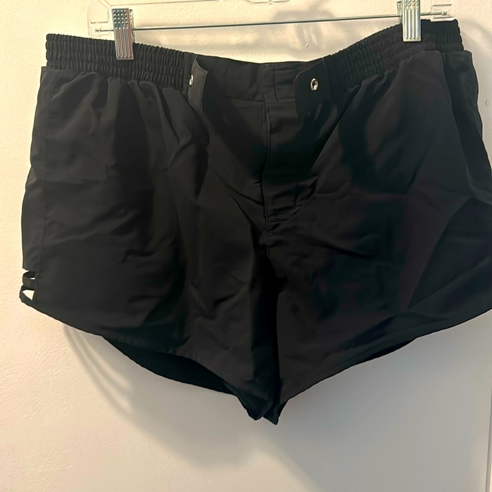 Coastal Cove Swim Shorts. In black size 16.